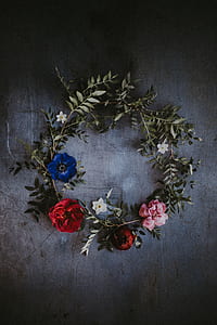pink, red, and blue flowers on board forming wreath thumbnail