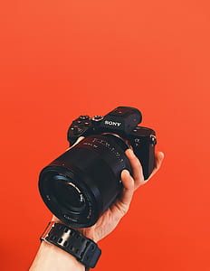 Sony DSLR camera on left hand thumbnail
