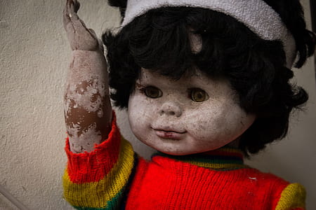 close-up photo of doll in red top thumbnail