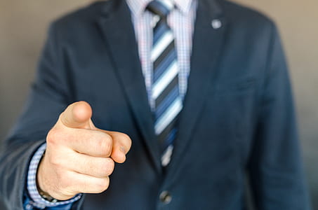 person wearing blue formal coat thumbnail