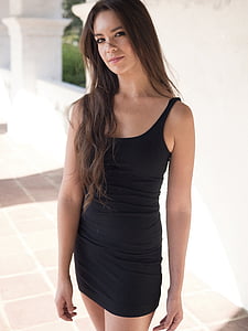 photo of woman wearing black sleeveless dress thumbnail