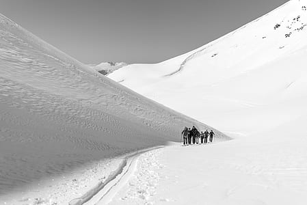 group of people walking on snow thumbnail