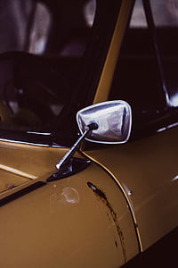 silver side mirror mounted on car thumbnail