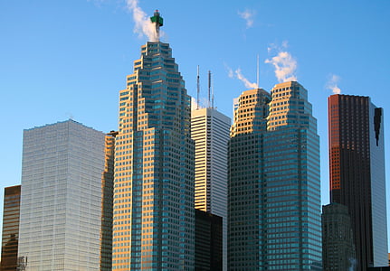 several high-rise buildings under blue sky thumbnail