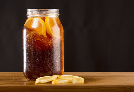 clear glass jar with lemon tea inside thumbnail