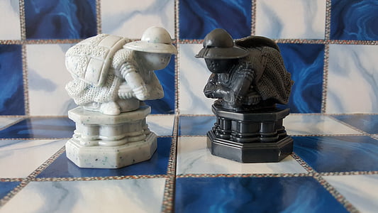 two black and white pawn chess pieces thumbnail
