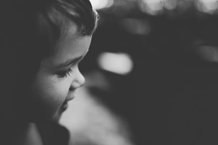 grayscale photo of toddler thumbnail
