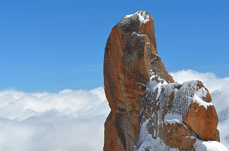 brown rock formation under blue sky thumbnail