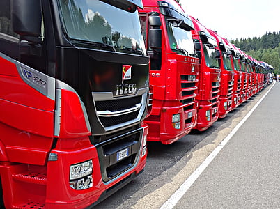 red-and-black trucks inlined in road thumbnail