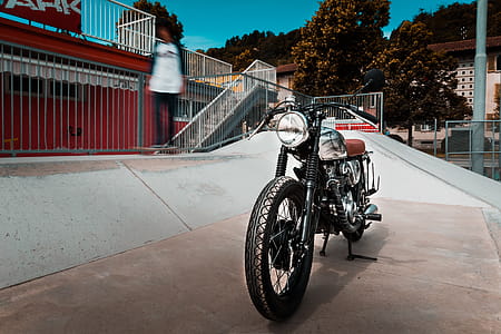 Parked Silver Standard Motorcycle thumbnail