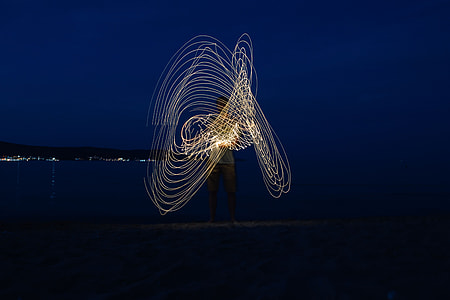 Light painting on the beach at nigh thumbnail