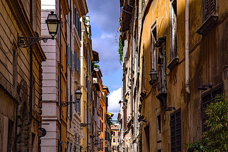 two brown buildings near each other during daytime thumbnail