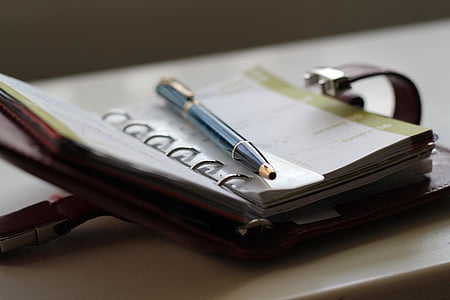 photo of blue ballpoint pen on notebook thumbnail