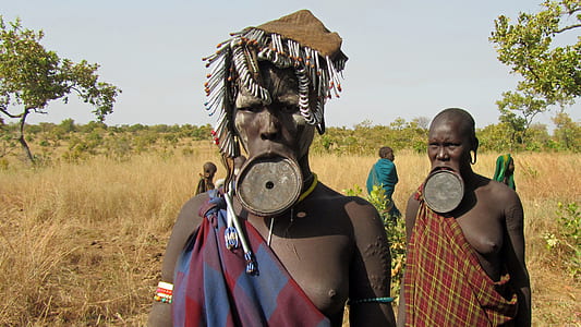tribe people near grass thumbnail