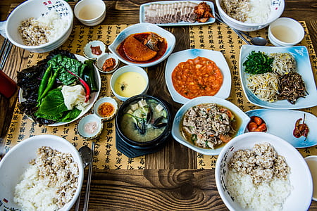 top view of assorted food meals placed on top of table thumbnail