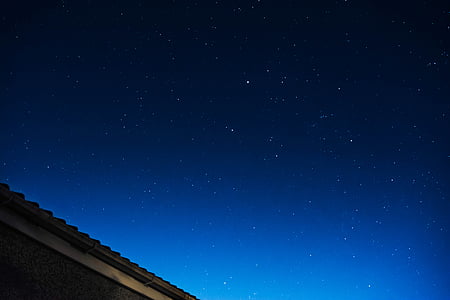 corrugated roof under blue skies thumbnail