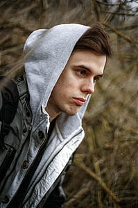 man wearing gray hooded jacket thumbnail