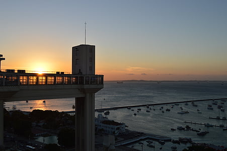 silhouette of building near sea thumbnail