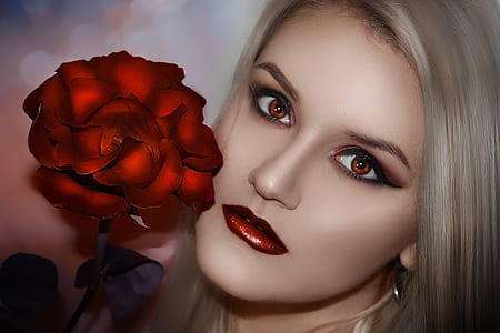selective focus photography of woman and rose thumbnail