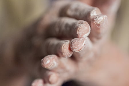 person closing hands with white powder thumbnail