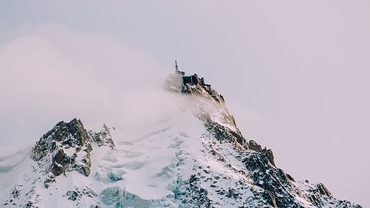 low angle view of snow-capped mountain thumbnail