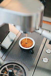 coffeemaker pouring a coffee in teacup thumbnail