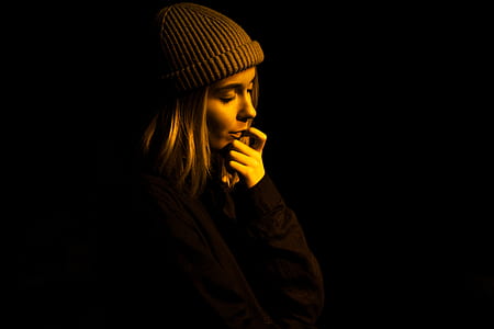 woman putting her finger on her lip thumbnail