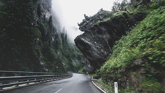grey road under sun thumbnail