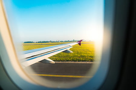 Airplane Wing Through Window During Take Off thumbnail