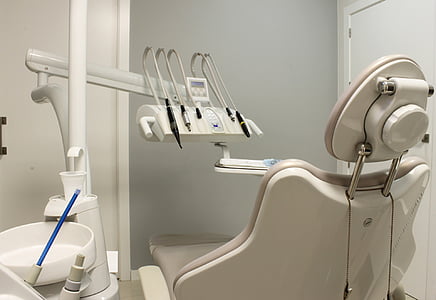 empty white dentist clinic chair thumbnail