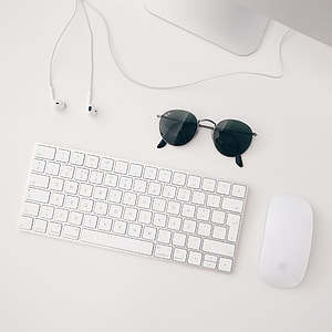 Apple Magic keyboard beside Apple Magic Mouse thumbnail