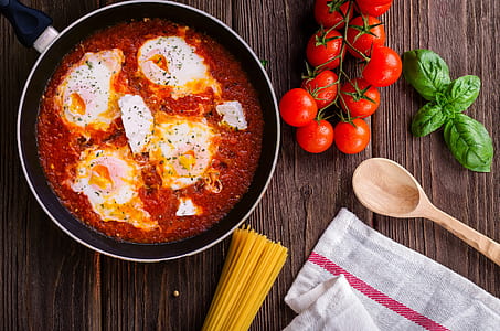 cooked food on black iron-cast frying pan thumbnail