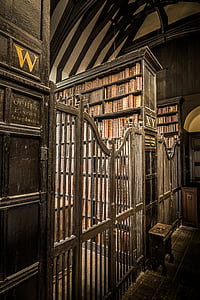 photo of brown wooden bookcases inside room thumbnail