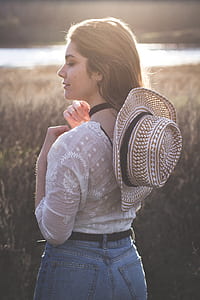 woman facing grass field thumbnail