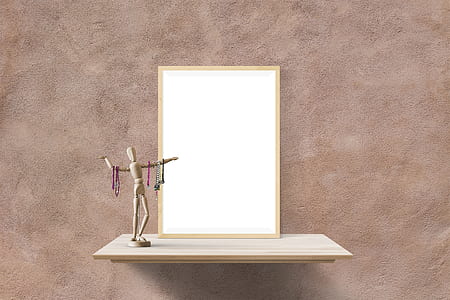brown puppet in front of mirror on wooden shelf thumbnail