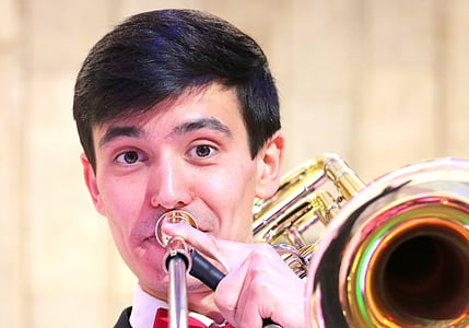 man playing musical instrument thumbnail