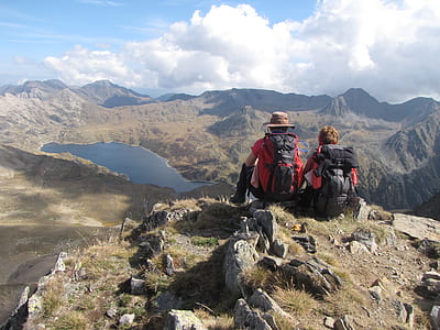 two person on hill during daytime thumbnail