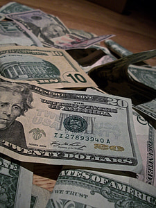 assorted-denomination U.S. dollar banknotes thumbnail