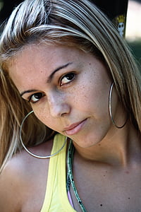 woman wearing yellow tank top thumbnail