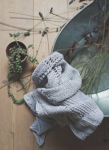 gray knitted textile on gray stainless steel container thumbnail