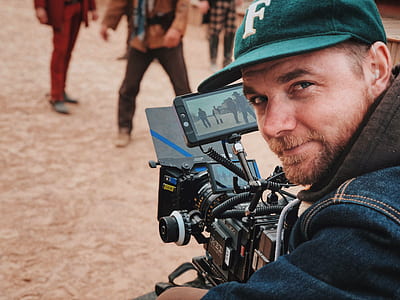 man taking video during daytime thumbnail
