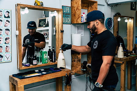 Man About to Hold Lotion Bottle thumbnail