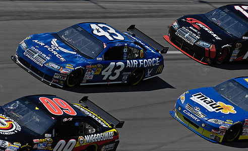 racing cars on road thumbnail