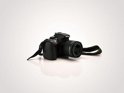 closeup photo of black Nikon DSLR camera thumbnail