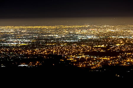 aerial photography of city at night thumbnail
