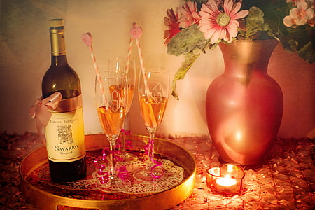 Navarro bottle beside three wine glasses on tray thumbnail