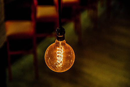 bokeh shot of orange LED light bulb thumbnail