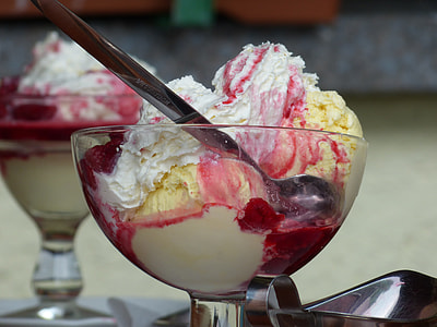 white, pink and yellow ice cream on glass bottle thumbnail