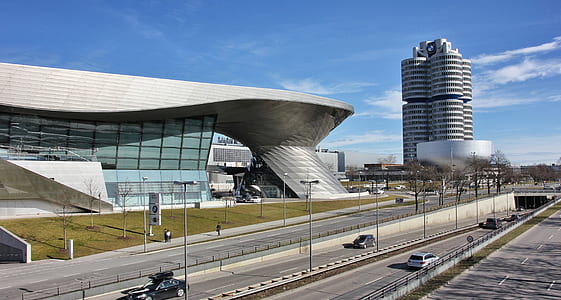 architectural photography of road path and buildings thumbnail