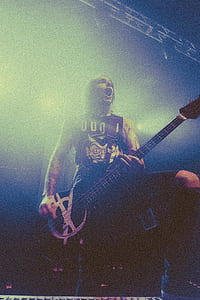 man playing bass guitar thumbnail